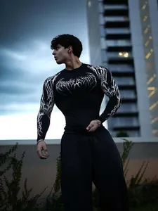Detail view of men's black compression shirt with white electric graphic