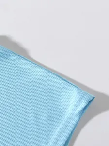 Detailed view of the light blue breathable mesh texture on this athletic sleeveless tank top