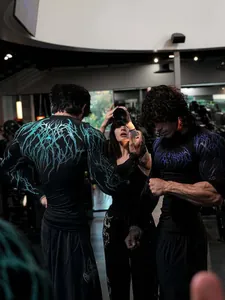 Professional detail view of men wearing high-stretch breathable fitness compression T-shirts