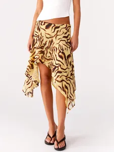 Close-up detail of a sexy leopard print mini skirt featuring an irregular ruffled hemline