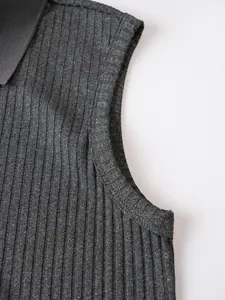 Macro view of gray ribbed sleeveless Polo shirt showing armhole stitching and fabric texture
