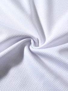 Detailed texture of high-performance white breathable mesh fabric for sports fitness t-shirts