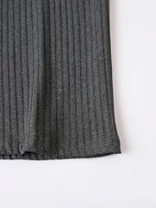 Close-up of dark grey ribbed knit fabric texture for men's polo vest