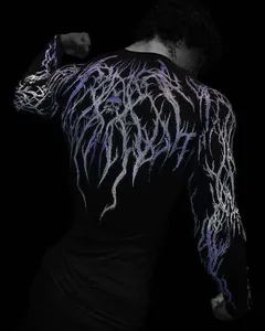 Close-up back view of men's compression shirt with purple lightning and skull design