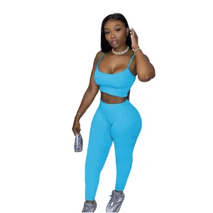 Full view of women's two-piece blue leisure set featuring a crop camisole and sleek leggings