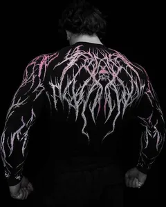 Close-up of men's compression workout shirt featuring a pink skull graphic on back