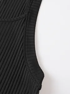 Detailed macro view showing the black ribbed knit texture and shoulder strap of a men's tank top