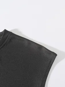 Detailed macro view of the breathable black mesh fabric on a men's sports tank top