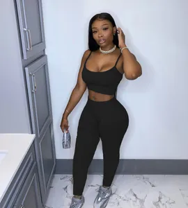 Black solid color sports two-piece set with camisole crop top and high-waist leggings