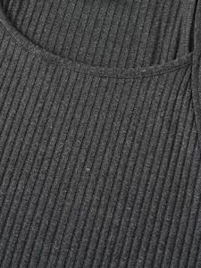Close-up of charcoal grey ribbed knit fabric on men's sleeveless tank top