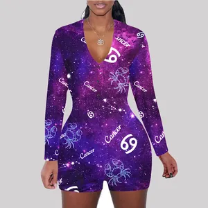 Detailed view of women's zodiac print long-sleeve romper with purple galaxy nebula design
