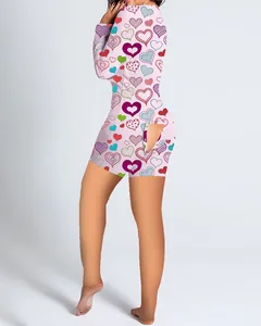 Detail of pink heart print loungewear jumpsuit with functional back flap design