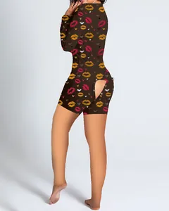 Detailed macro view of brown Valentine's romper featuring functional lip-print back flap