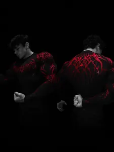 Men's athletic compression fitness shirt with unique red graphic pattern for gym training