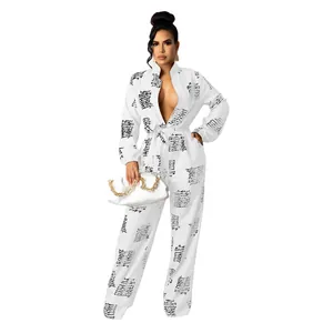 Elegant women's long-sleeve jumpsuit featuring a stylish black script pattern print