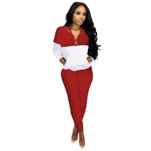 Conjunto de dos piezas rojo y blanco con top con cremallera y leggings
