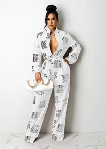 Casual white long sleeve jumpsuit featuring black script print and waist belt for women