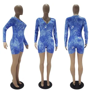 Detailed front, side, and back views of a blue Sagittarius constellation print romper
