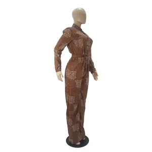 Women's casual brown long sleeve jumpsuit with white script print and waist tie.