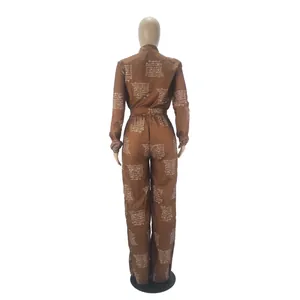 Casual brown shirt-style long-sleeved jumpsuit with elegant white script print