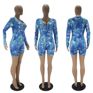 Close-up multi-view of blue galaxy print long sleeve romper with Pisces zodiac signs