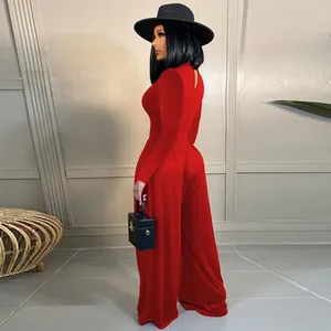 Elegant red long sleeve bodycon top and high-waisted wide-leg trousers set for women