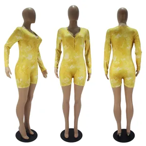 Yellow long sleeve Scorpio constellation print romper jumpsuit shown from three different angles