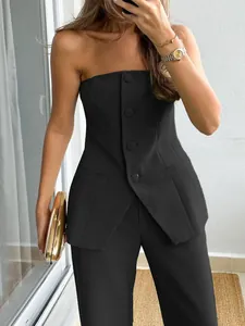 Elegant black strapless two-piece suit set with decorative buttons and matching trousers.