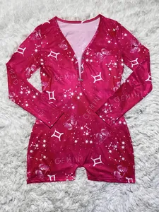 Macro view of a deep pink Gemini constellation print long sleeve romper for home wear