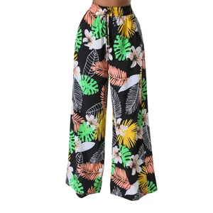 Damen Weite Hose mit hoher Taille und lebhaftem tropischem Blatt- und Blumenmuster.