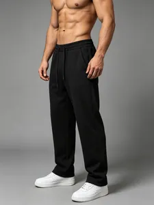 Professional detail of men's black loose straight-leg sports pants with drawstring