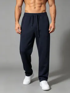 Detail view of navy blue loose-fit straight-leg men's quick-dry sports joggers