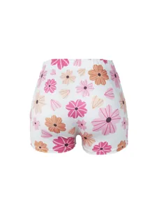 Vue détaillée du short de yoga pour femme à imprimé floral rose et orange, taille haute.