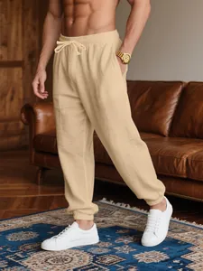 Breathable linen-blend joggers for men in beige with drawstring waist and cuffed ankles