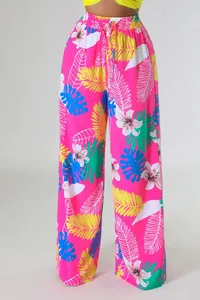 Leuchtendes tropisches Blatt- und Blumenmuster auf rosa Damen-Hose mit weitem Bein