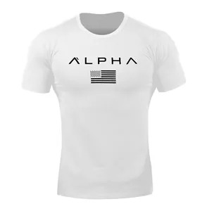 Close-up view of the black ALPHA lettering and flag graphic print on a white sports t-shirt