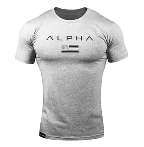 Close-up detail of grey slim fit sports T-shirt featuring ALPHA text and US flag graphic design