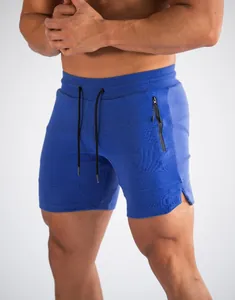 Detailansicht blaue schnelltrocknende Sportshorts mit Kordelzug und Reißverschluss.