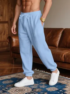 Light blue men's breathable casual jogger pants with drawstring waist for summer