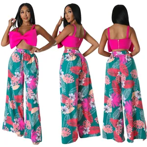 Detailansichten von Damen-Crop-Top mit Schleife und tropisch bedruckter Weithose