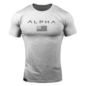 Grey men's athletic round neck t-shirt featuring ALPHA logo and American flag print.