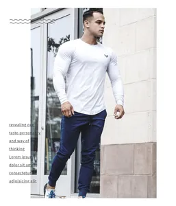 Maglia a compressione a maniche lunghe da uomo bianca per fitness e corsa all'aperto