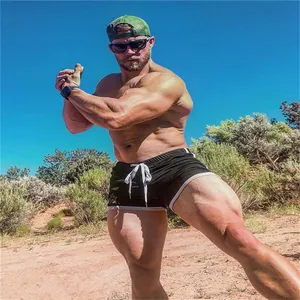 Pantalones cortos de fitness de malla para hombre, secado rápido para musculación.
