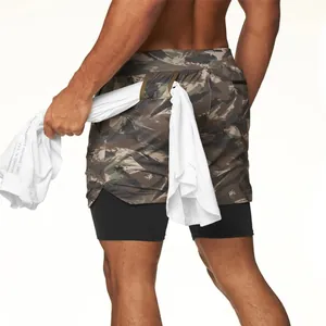 Detail of men's camo gym shorts featuring back waist loop for shirt storage.