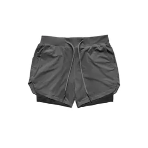 Detailed view of grey double-layer athletic shorts for men's professional gym workouts