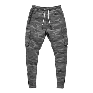 Close-up of grey camouflage cargo joggers with multiple pockets and ankle zippers