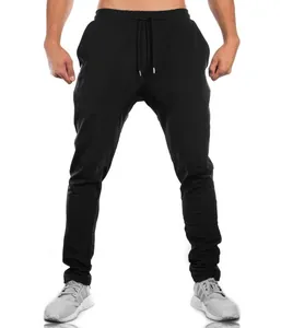 Front view of black slim-fit athletic joggers for men on model