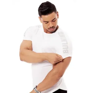 Close-up of white short-sleeve compression shirt showing Bulking print on sleeves.