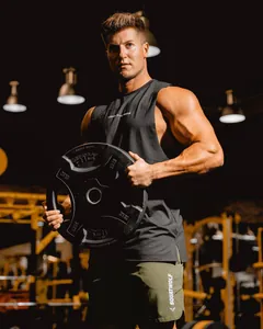 Close-up of black sleeveless muscle fitness tank top with 'Lead the Pack' chest print