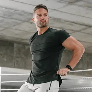 Detailed view of a men's olive green muscle fit compression t-shirt for bodybuilding